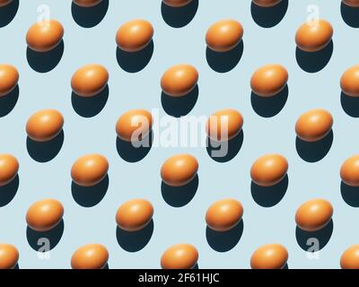 Egg on a blue background, banner, rhythmic pattern. Stock Photo