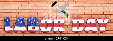Text LABOR DAY in colors of USA flag against brick background Stock Photo