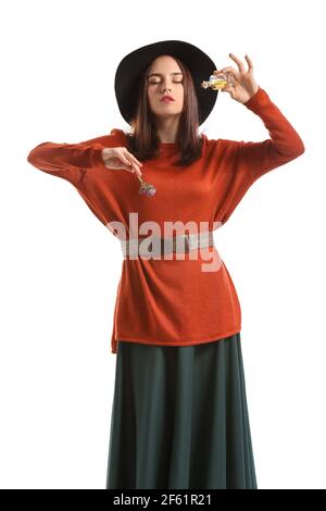 Female witch on white background Stock Photo