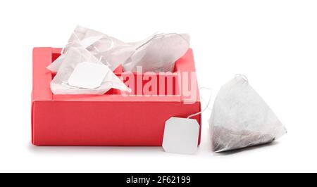 Box with tea bags on white background Stock Photo