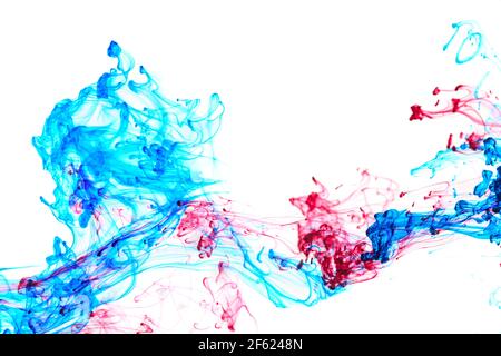 Abstract pattern falling into the water drop of red and blue ink Stock Photo