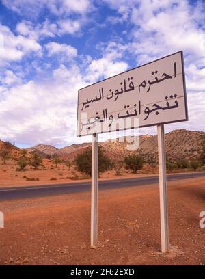 Road sign in Arabic, Anti-Atlas Mountains, Atlas Mountains, Sous-Massa Region, Kingdom of Morocco Stock Photo
