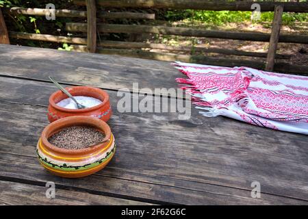 Salt and pepper on a wooden table. Rural Ukrainian national style Stock Photo