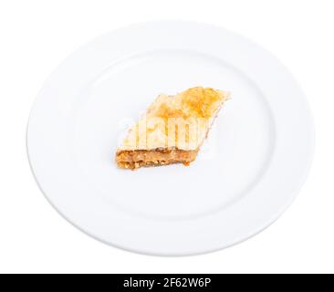 Classic turkish baklava with walnuts. Isolated on a white background. Stock Photo