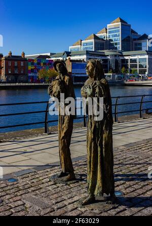 A picture of two statues of the Famine Memorial, in Dublin. Stock Photo