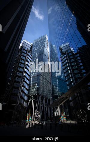 City of London England UK March 2021 A confusion of modern architecture in the City of London. Showing the 122 Leadenhall Street known as the Cheese G Stock Photo