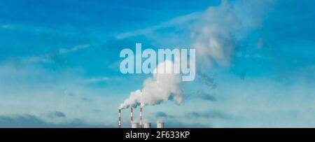 Environmental pollution problems and ecology concept. Smoke comes from a chimney of an industrial enterprise or thermal power plant and carbon dioxide Stock Photo