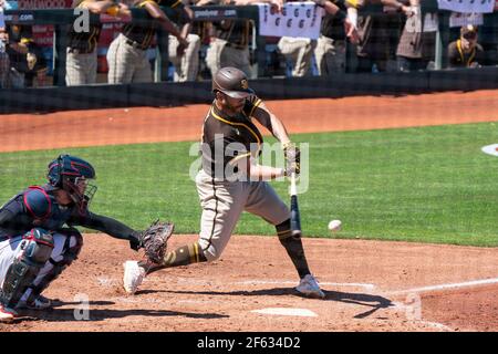 San Diego Padres left fielder Tommy Pham (28) bats during a spring training game against the Cleveland Indians, Sunday, March 28, 2021, in Phoenix, AZ Stock Photo