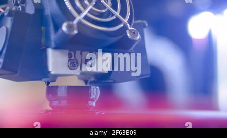 Three dimensional printing machine prints physical 3D model - close up Stock Photo