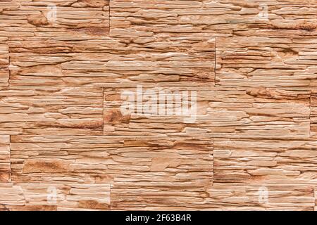Sand stone tile texture, color decorative wall with abstract patterned background. Stock Photo