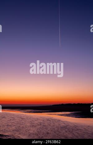 Tidal pools on Talacre beach at dawn, North Wales coast Stock Photo