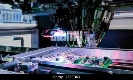 Quality testing of printed circuit boards - flying probe test at factory Stock Photo