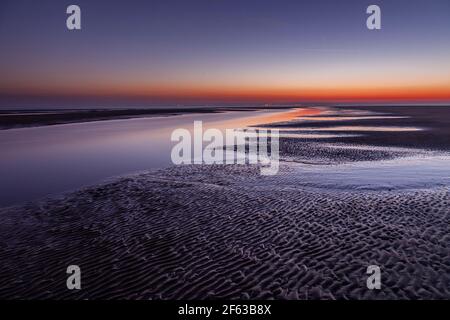 Tidal pools on Talacre beach at dawn, North Wales coast Stock Photo