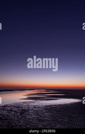 Tidal pools on Talacre beach at dawn, North Wales coast Stock Photo