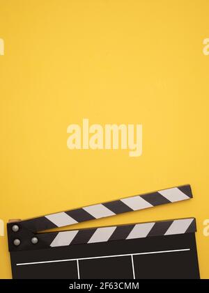 Film Reel with Clap Board and Popcorn Box Isolated on White Background  Stock Photo - Alamy