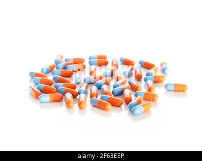 Bunch of orange and blue capsules shot on white background Stock Photo