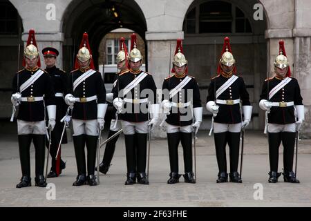 21 April 2011. London, England. Soldiers of the Queen's Guard, Blues and Royals Regiment of the Household Cavalry changing guards at Horse Guards Arch Stock Photo