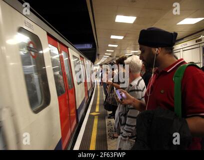 London, England, Victoria Station, Tube, Underground, Westminster Abbey, London Evening Standard, Tourism, Commuters. Stock Photo