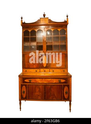 Antique mahogany cupboard in colonial style, handmade. Stock Photo