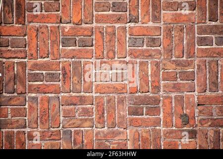 Pattern on a red brick wall in Ullanlinna district of Helsinki, Finland Stock Photo