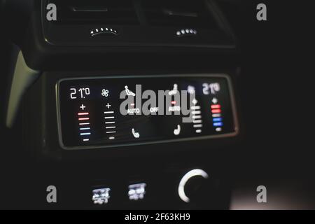 Control panel rear climate control. A modern control screen in a premium car. Stock Photo
