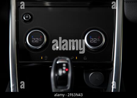 Conditioner climate control in a modern car. Buttons.. Stock Photo