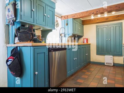 Modern Wooden Kitchen With Blue Tiles Stock Photo Alamy