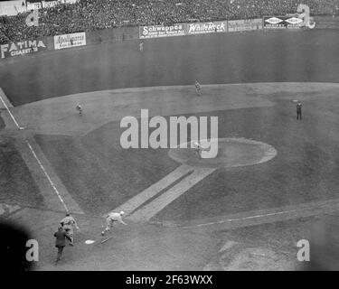 Eddie Collins, Philadelphia Athletics, bunts against the New York Giants, 9th October 1913 in the 3rd game of the World Series at the Polo Grounds. Stock Photo