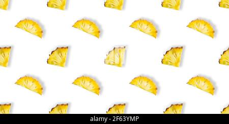 Seamless pattern of fresh ripe pineapple slices isolated on white background. Top view. Exotic tropical fruit Stock Photo