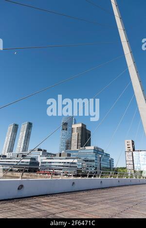 Buenos Aires, Argentina; Oct 31, 2019: View from the Puente de la Mujer, a modern footbridge in Puerto Madero, an exclusive and touristic neighborhood Stock Photo