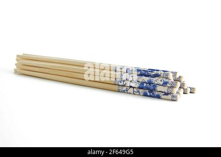 Wooden chopsticks with stacked stack pattern isolated on white background Stock Photo