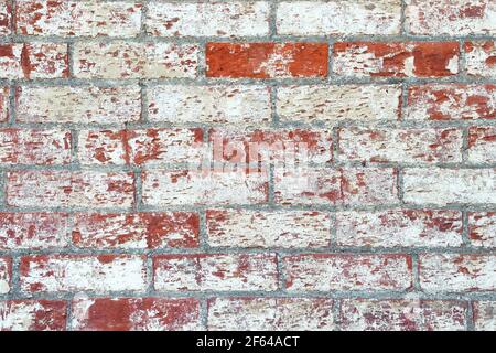 Old brick wall grunge textured background or wallpaper. Stock Photo