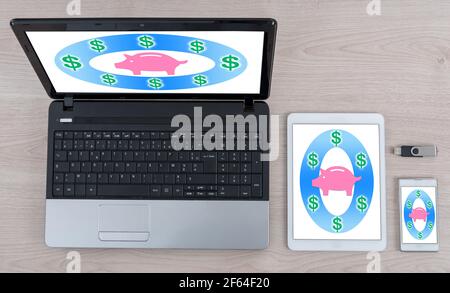 Saving money concept shown on different information technology devices Stock Photo