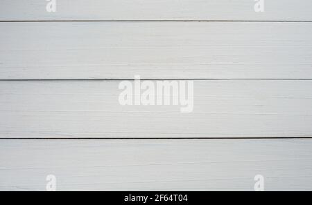 Wood table painted white texture background with copy space for your designs or add text to make work look better. High resolution wooden backdrop for Stock Photo