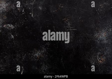 Black, damaged metal texture background Stock Photo