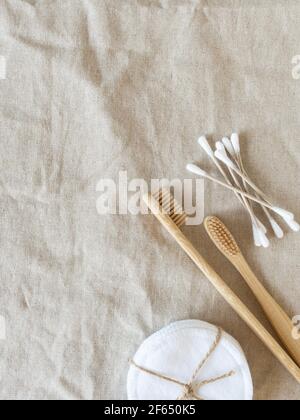 Minimal zero waste concept individual items for skin care and hygiene on natural textile background. Top view. Copy space Stock Photo