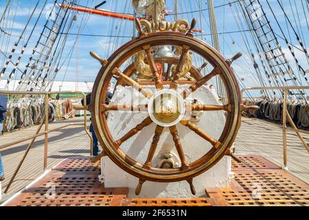 steering wheel of a 100 years old Russian sailing ship (Sedov) Stock Photo