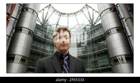 Jamie Oliver at a photocall before his press conf re school dinners held at Channel Four in Londonpic David Sandison 30/3/2005 Stock Photo