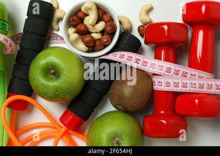 Weight Loss Accessories on White Background, Close Up Stock Photo