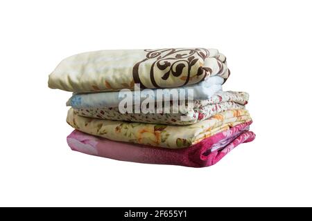 a stack of colored clean bed linen on a white background Stock Photo
