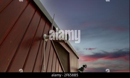 Wirelless white surveillance camera for security, CCTV concept Stock Photo