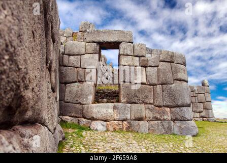 Stone door. View of Sacsayhuaman, Inca ruins in Cusco or Cuzco town, Peru Stock Photo