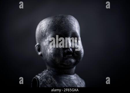 Creepy doll in the dark Stock Photo