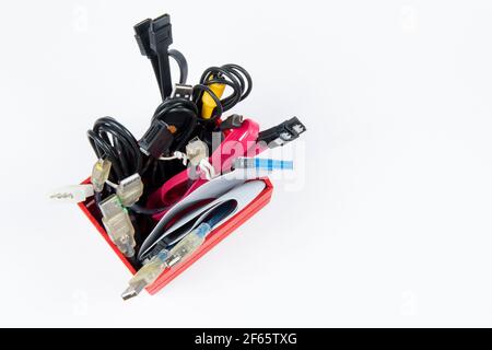 technological waste that remains in residence as computer cables Stock Photo