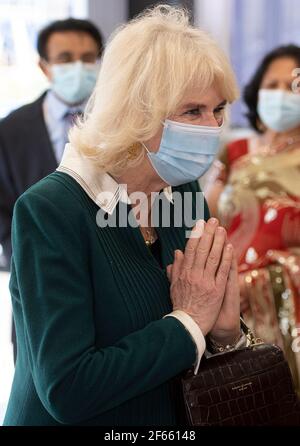The Duchess of Cornwall wearing a mask during a visit to the Kamsons Pharmacy head office and warehouse in Uckfield, East Sussex, to thank frontline workers. Picture date: Tuesday March 30, 2021. Stock Photo