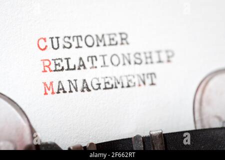 Customer relationship management phrase written with a typewriter. Stock Photo