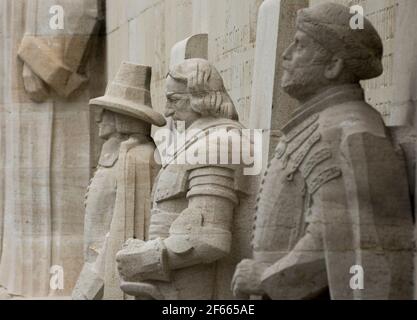 Statues of Roger Williams, Oliver Cromwell and Stephen Bocskai  on the Reformation Wall, Parc des Bastions, Geneva, Switzerland Stock Photo