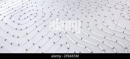 underfloor heating system pipes on insulation. radiant floor heating Stock Photo