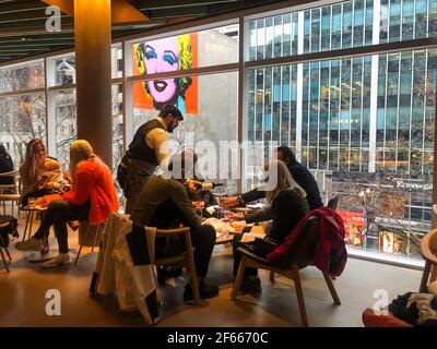 Chicago, USA. 21st Nov, 2019. The Starbucks Reserve Roastery Chicago is the world's largest Starbucks located on the corner of N. Michigan Avenue and Erie Street in Chicago, Illinois on November 21, 2019. The venue also serves alcohol and is five-stories tall and covers 35,000 square feet. (Photo by Samuel Rigelhaupt/Sipa USA) Credit: Sipa USA/Alamy Live News Stock Photo