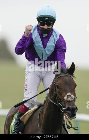 File photo dated 26-09-2020 of Alcohol Free ridden by jockey Oisin Murphy (left) celebrates winning The Juddmonte Cheveley Park Stakes during day three of The Cambridgeshire Meeting at Newmarket Racecourse. Issue date: Tuesday March 30, 2021. Stock Photo